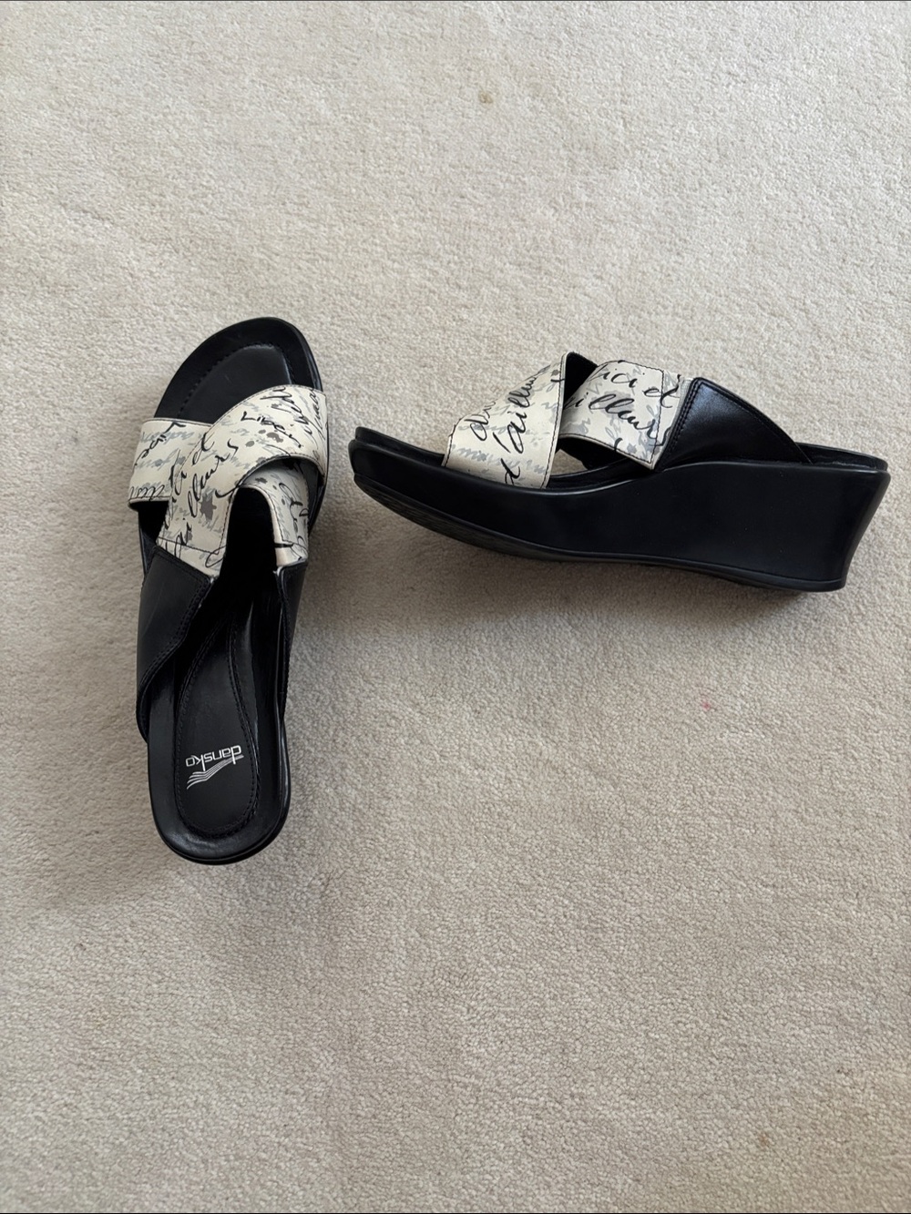 Dansko Black Wedge Sandals new with Cream Script Straps